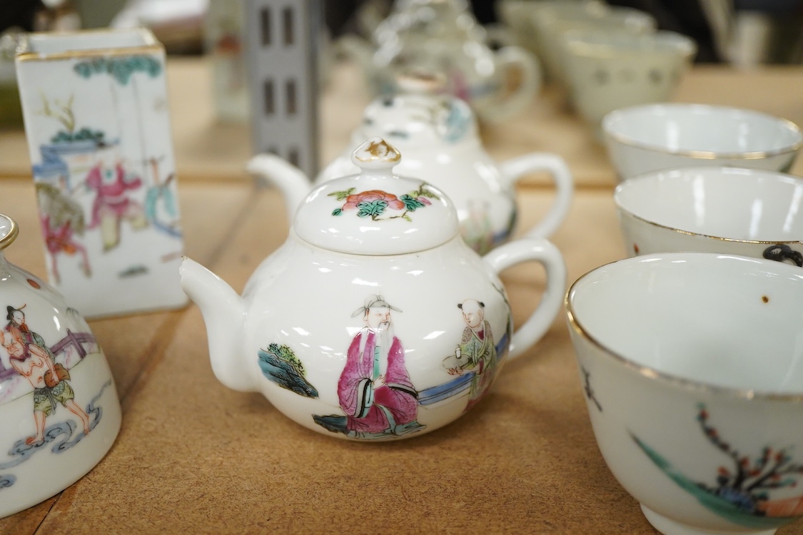 A collection of late 19th century Chinese famille wares to include a water pot, two teapots, and a square brushpot, together three Republic period tea bowls, largest 9cm high